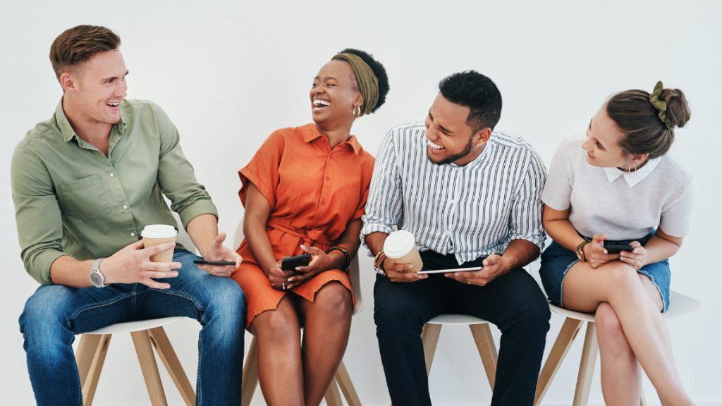 Group of happy employees illustrating wellness